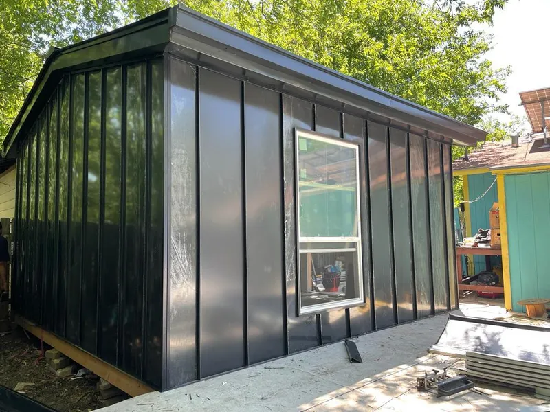 Black standing seam metal wall panels for Roof Inspection in Clay